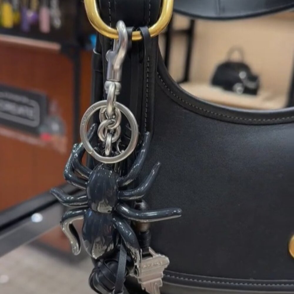 Coach Spider Bag Charm NWT CAX79 - ๐๐จ๐ฅ๐ ๐๐ฎ๐ญ ๐๐๐ซ๐จ๐ฌ๐ฌ ๐๐จ๐๐๐ก! - Picture 12 of 13